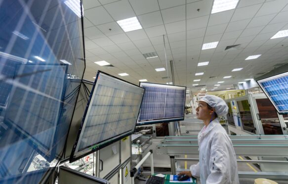 Solar photovoltaic module production, China.