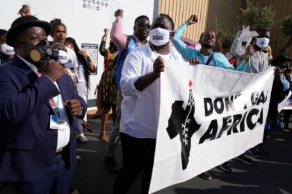 Demonstrators participate in a 'Don't Gas Africa' protest at the COP27.