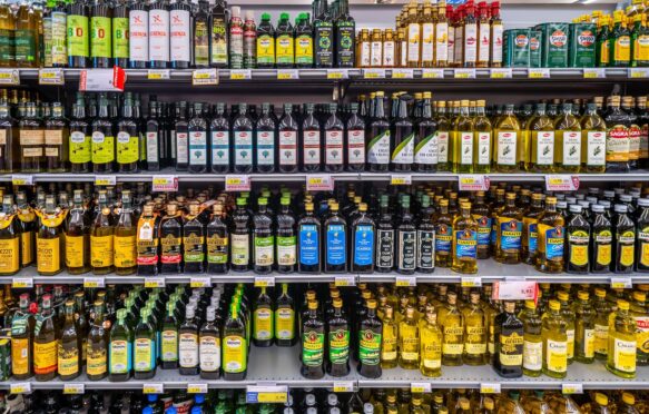 Olive oil shelves at a supermarket.