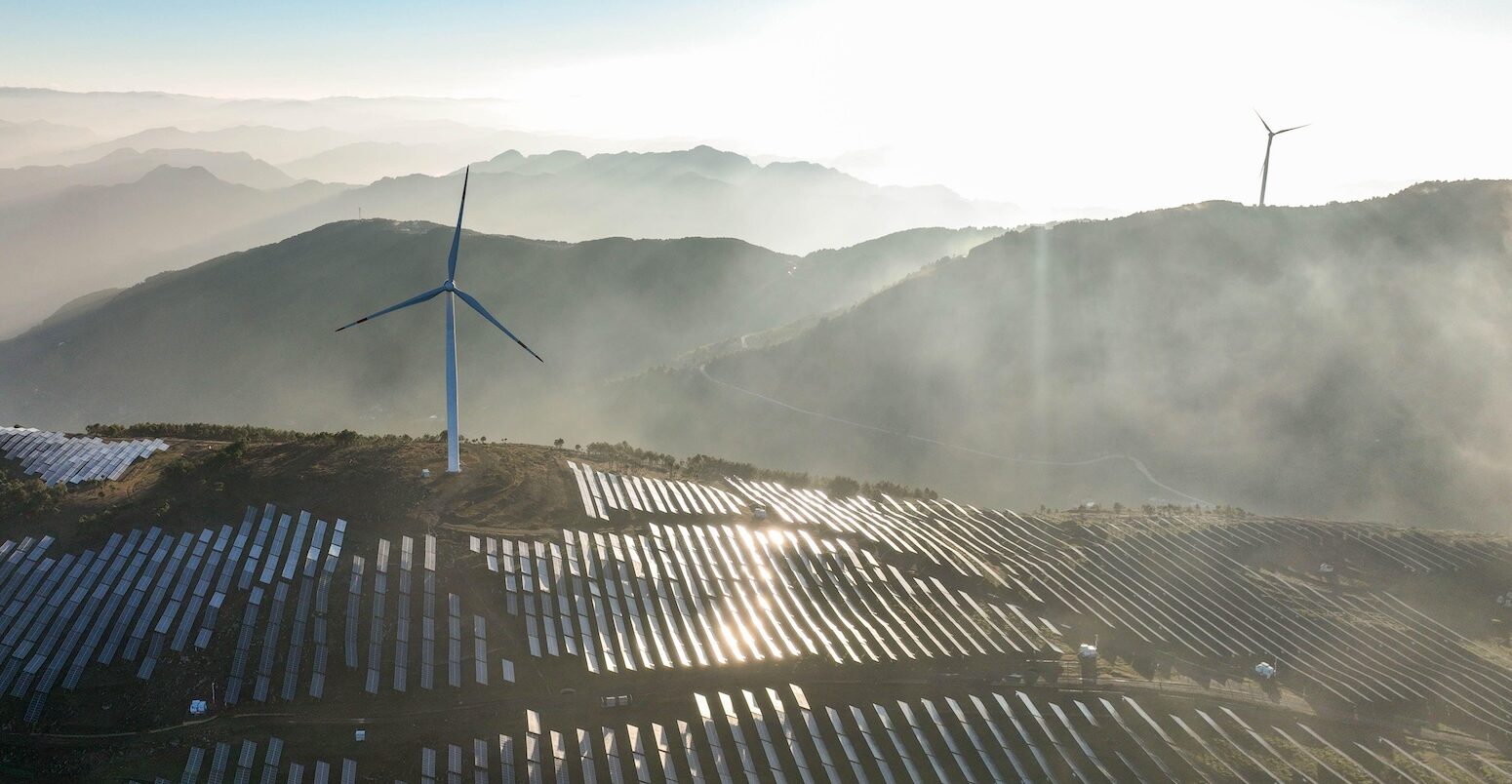 Wind turbines and solar photovoltaic panels in Guizhou, China.