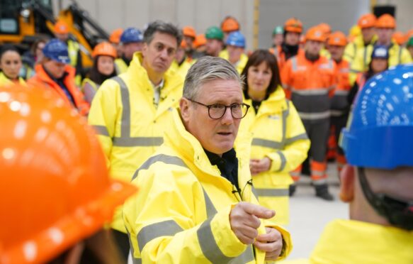 Labour’s Sir Keir Starmer, Rachel Reeves and Ed Miliband visiting Teesport in April 2024.