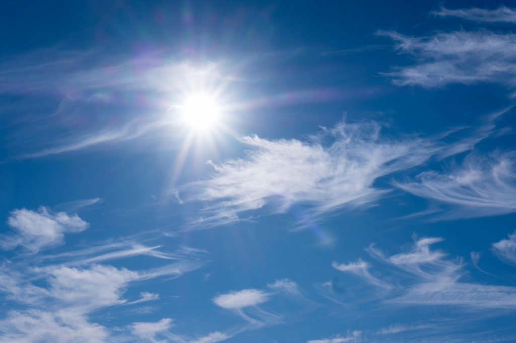 Cirrus clouds against sun, Pomerania, Germany. Credit: imageBROKER / Alamy Stock Photo. HCB8ND