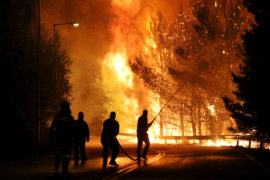 Firemen battle with the flames in Kalamos 2017.