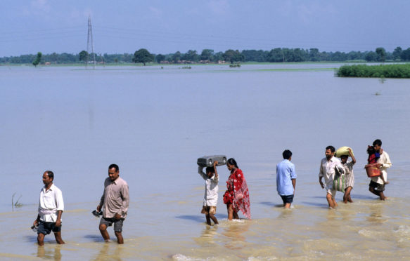 Flooding at the Bagmati river in India, a branch of the Ganges, due to heavy monsoon rains and melting of Himalaya glaciers.