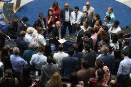 Delegates huddle during the contact group on the Global Stocktake, 14 June 2023. Credit: Photo by IISD/ENB | Kiara Worth.