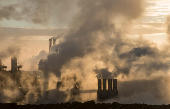 Smoke emitting from factory