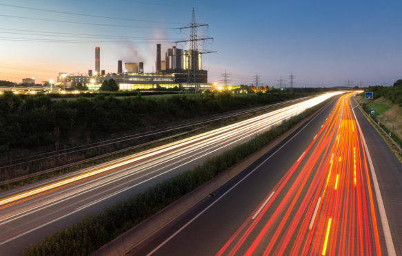 Long exposure sunset over German highway along power plant , Germany Credit: Zoonar GmbH / Alamy Stock Photo