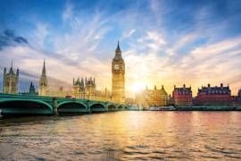 London cityscape with Big Ben and Westminster Bridge at sunset